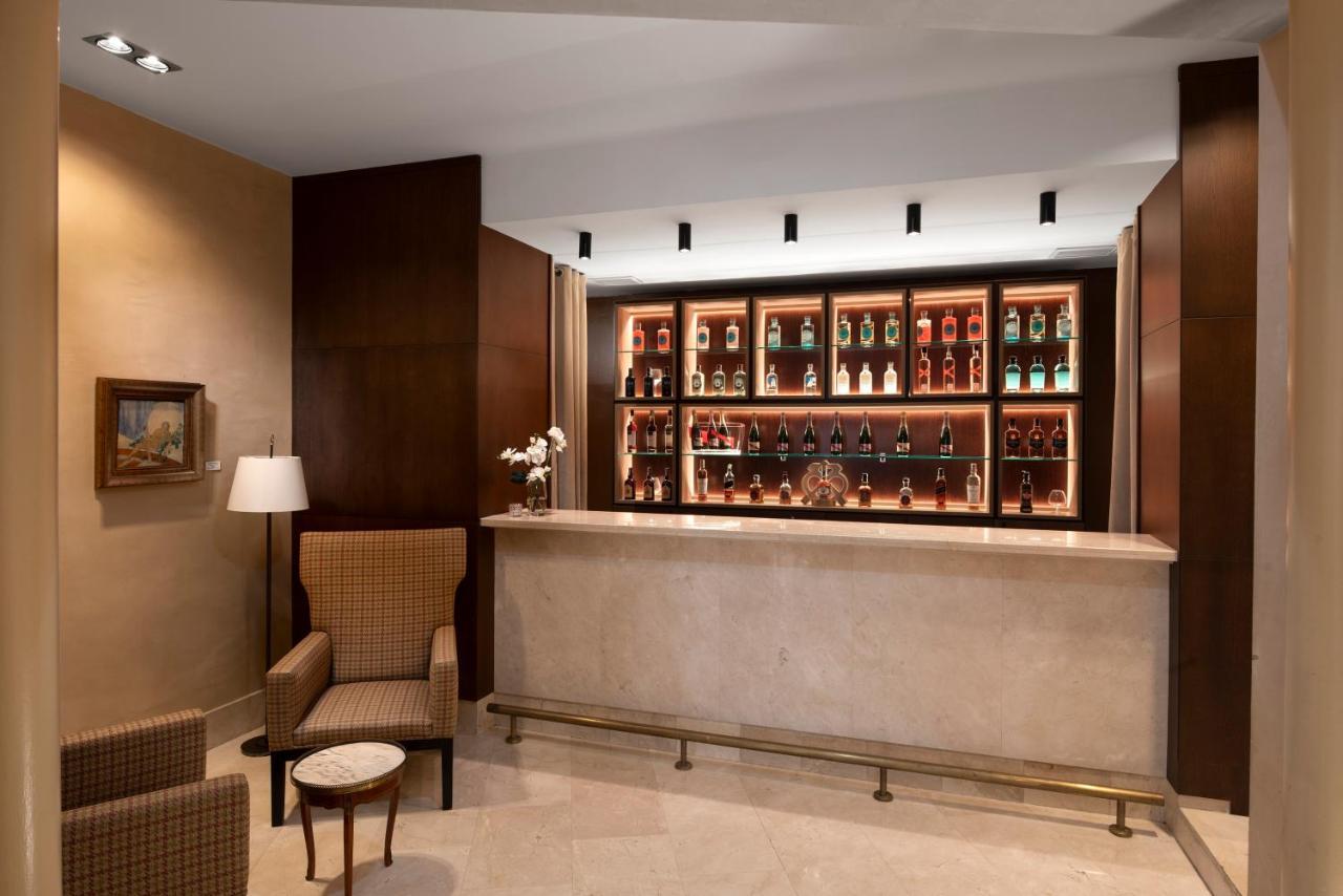 Palacio De Aviles Affiliated By Melia Zewnętrze zdjęcie A bar in a hotel